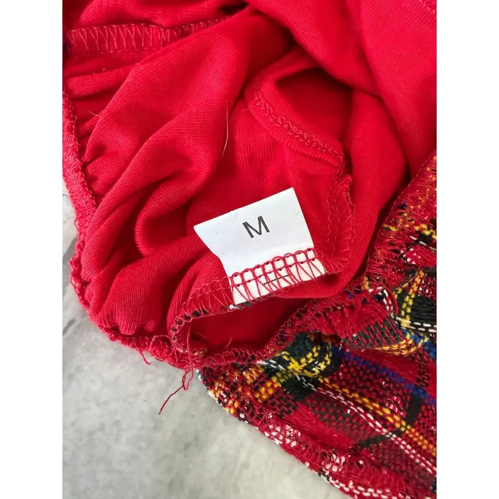 Dog Christmas Dress Fits Like a Small tag says Medium